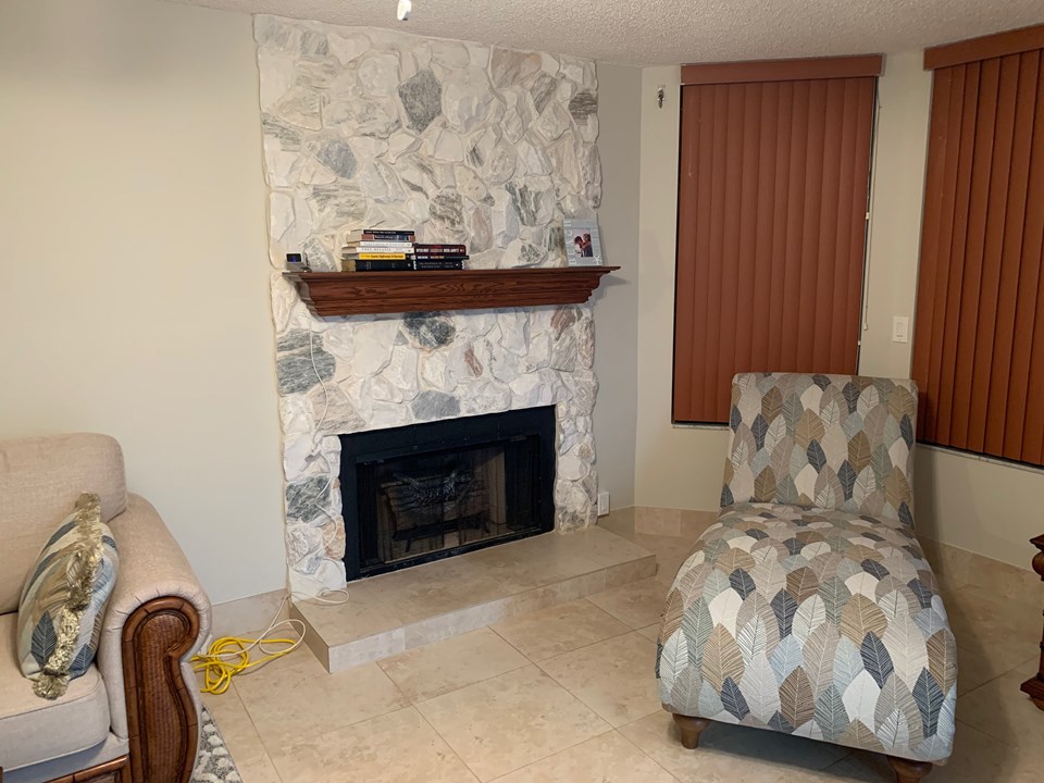 living room with decorative fireplace