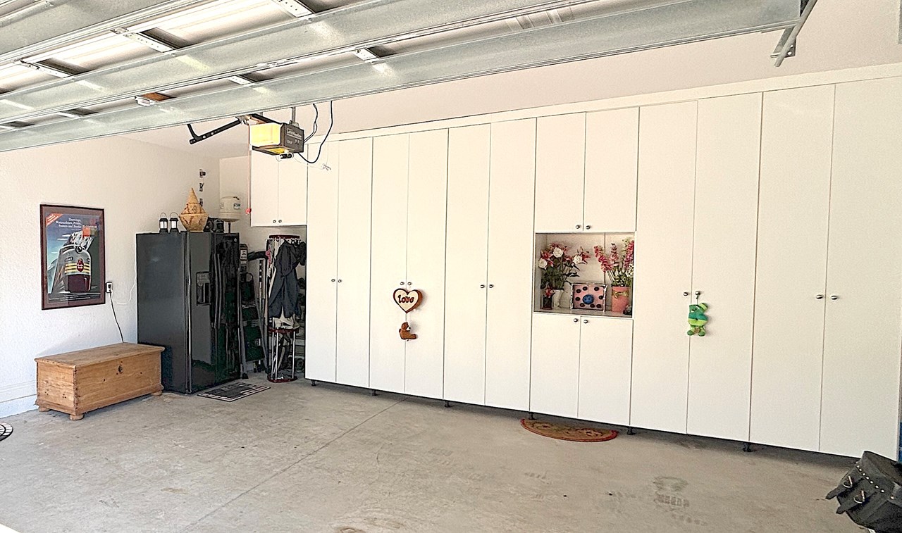 garage with custom cabinets