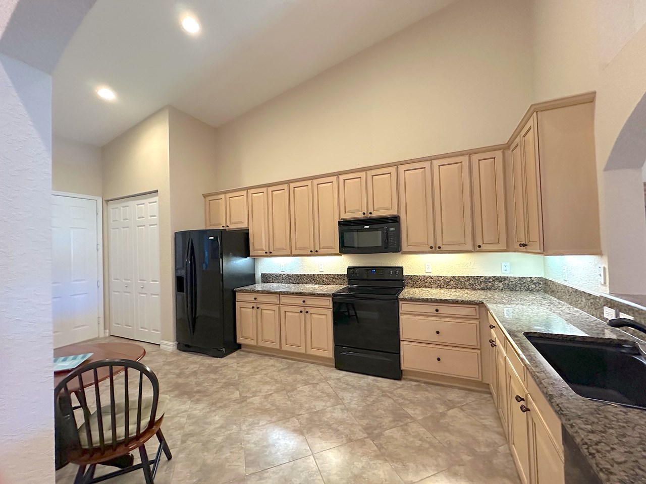 granite counters, loads of cabinets